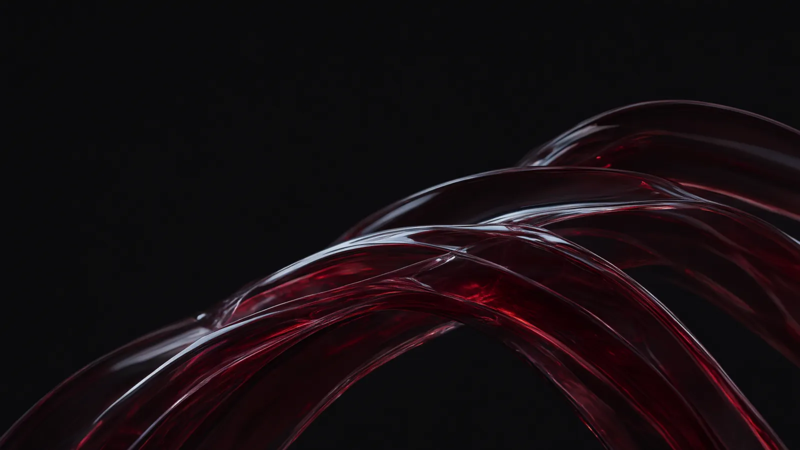Crimson glass ribbons in soft focus.